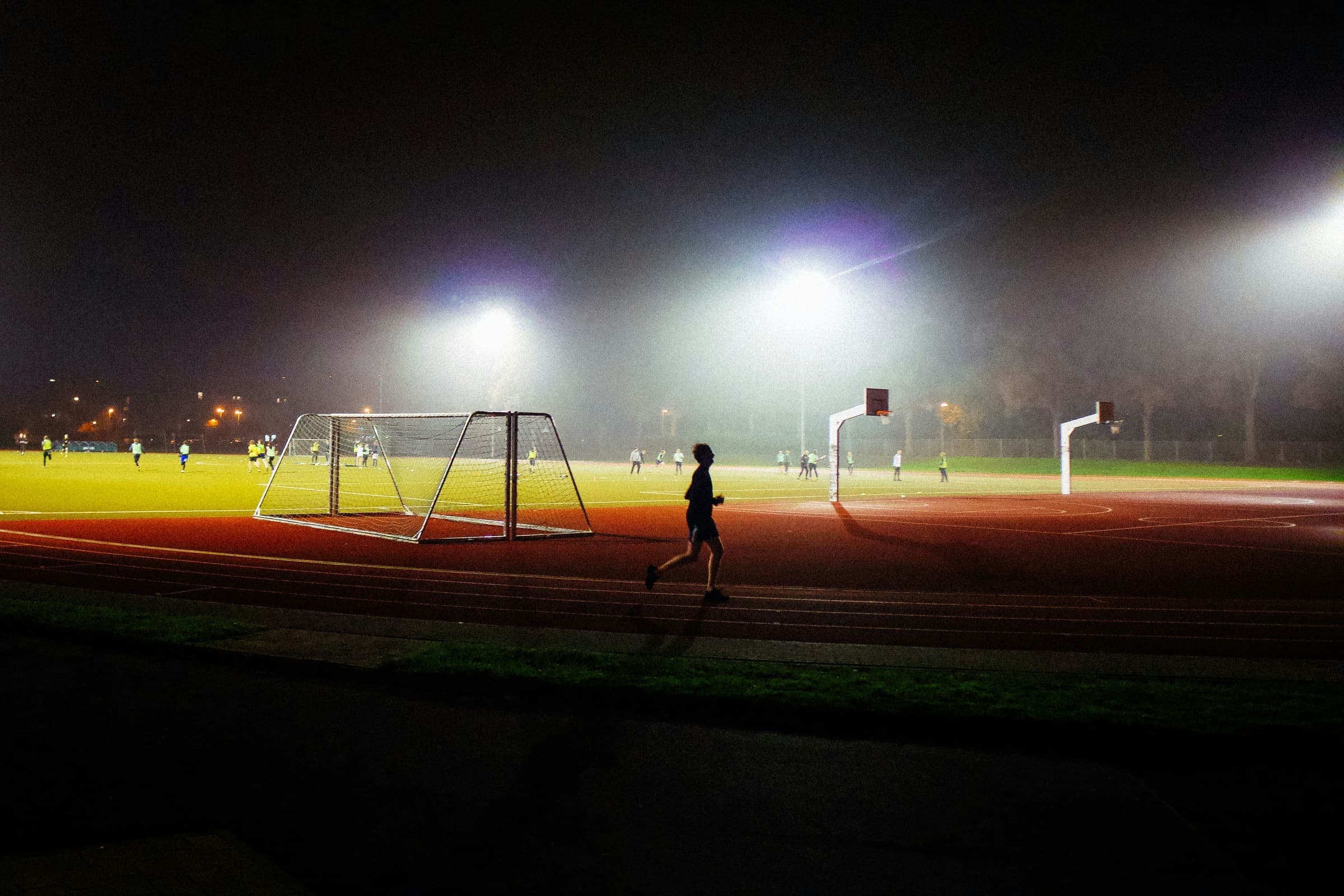 Floodlit turf ground at night